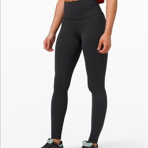 Black winder under lululemon leggings
